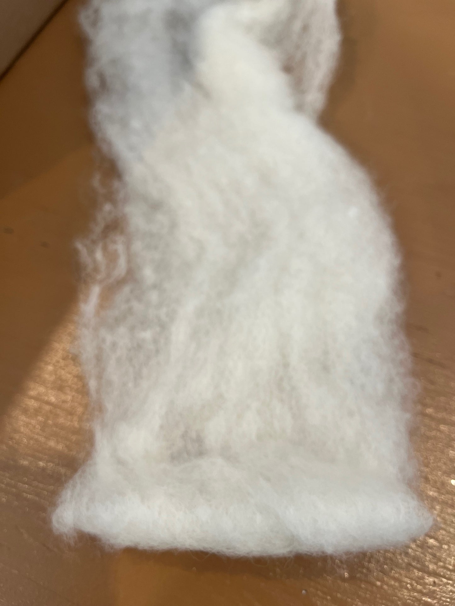 Ivory wool roving used for needle and wet felting by Caron Designs