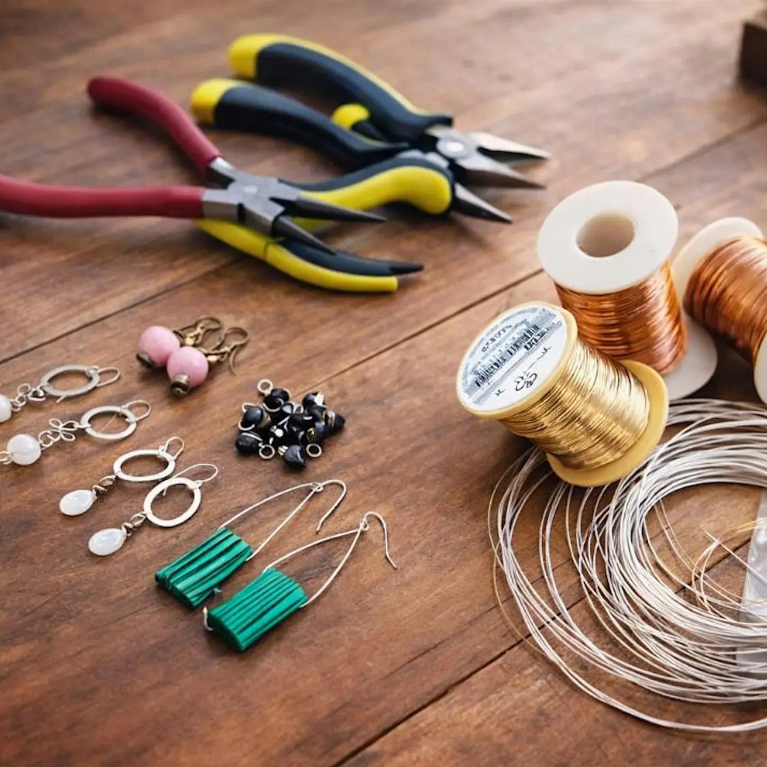 Wire wrapping supplies to create one of kind earrings at Caron Designs studio
