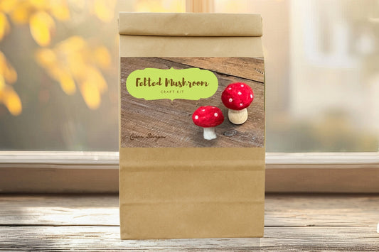 DIY craft kit to create a needle felted mushroom(s) with wool roving, felting needles, and a bean pot by Caron Designs